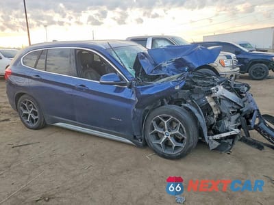 Czwarte zdjęcie samochodu z boku: 2018 BMW X1 XDRIVE28I VIN:WBXHT3C3XJ5K27785 - miniatura