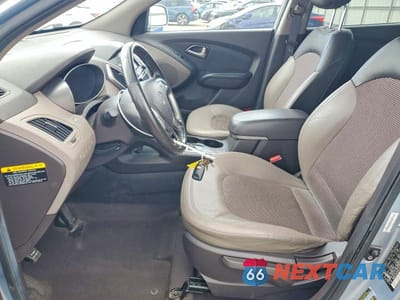 Zdjęcie 7 z 13 samochodu: 2010 HYUNDAI TUCSON GLS VIN:KM8JUCAC0AU076536 - miniatura