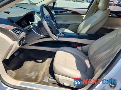 Zdjęcie 7 z 12 samochodu: 2016 LINCOLN MKZ HYBRID VIN:3LN6L2LU3GR612694 - miniatura