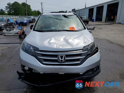 Piąte zdjęcie samochodu w środku: 2012 HONDA CR-V EXL VIN:JHLRM4H76CC013247 - miniatura