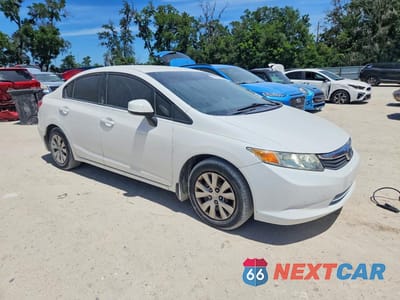 Czwarte zdjęcie samochodu z boku: 2012 HONDA CIVIC LX VIN:19XFB2F58CE073941 - miniatura