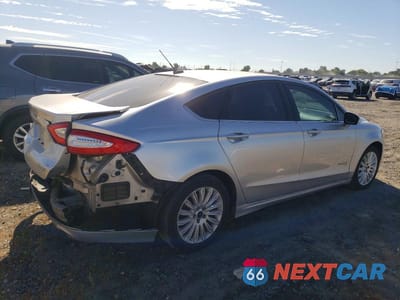 Trzecie zdjęcie samochodu z tyłu: 2016 FORD FUSION SE HYBRID VIN:3FA6P0LU2GR157212 - miniatura