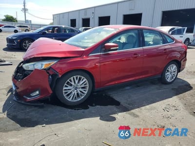 2017 FORD FOCUS TITANIUM 1FADP3J29HL322974 - główne zdjęcie licytacji z USA - miniatura