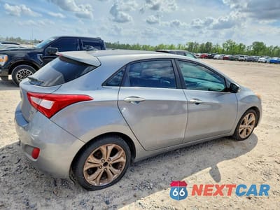 Trzecie zdjęcie samochodu z tyłu: 2014 HYUNDAI ELANTRA GT BASE VIN:KMHD35LH0EU165307 - miniatura