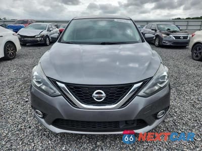 Piąte zdjęcie samochodu w środku: 2019 NISSAN SENTRA SR VIN:3N1AB7AP9KY321470 - miniatura
