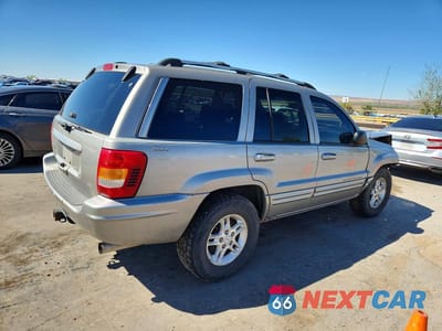 Trzecie zdjęcie samochodu z tyłu: 2000 JEEP GRAND CHEROKEE LIMITED VIN:1J4GW58N8YC211171 - miniatura