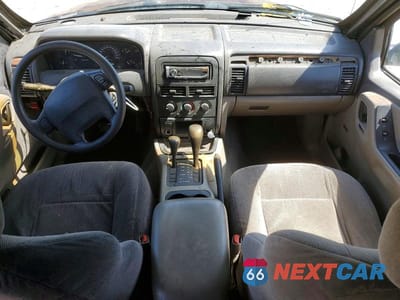 Zdjęcie 8 z 13 samochodu: 1999 JEEP GRAND CHEROKEE LAREDO VIN:1J4GW58S3XC521457 - miniatura