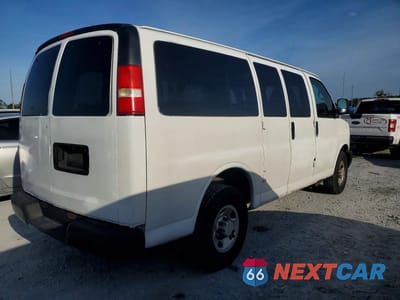 Trzecie zdjęcie samochodu z tyłu: 2012 CHEVROLET EXPRESS G3500 LS VIN:1GNZGXFA4C1174512 - miniatura