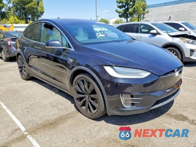 Czwarte zdjęcie samochodu z boku: 2016 TESLA MODEL X VIN:5YJXCBE28GF021332 - miniatura