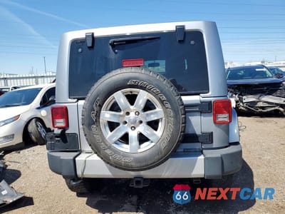 Zdjęcie 6 z 12 samochodu: 2013 JEEP WRANGLER UNLIMITED SAHARA VIN:1C4HJWEG0DL678258 - miniatura