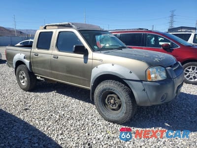 Czwarte zdjęcie samochodu z boku: 2001 NISS FRONTIER XE VIN:1N6ED27TX1C315357 - miniatura