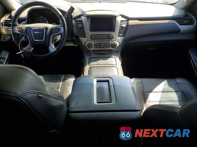 Zdjęcie 8 z 13 samochodu: 2015 GMC YUKON DENALI VIN:1GKS2CKJ9FR146464 - miniatura