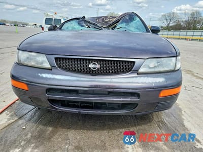 Piąte zdjęcie samochodu w środku: 1995 NISSAN MAXIMA GXE VIN:JN1CA21D8ST068896 - miniatura