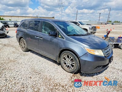 Czwarte zdjęcie samochodu z boku: 2011 HONDA ODYSSEY EXL VIN:5FNRL5H63BB027475 - miniatura