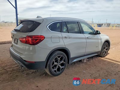 Trzecie zdjęcie samochodu z tyłu: 2018 BMW X1 XDRIVE28I VIN:WBXHT3C37J5L24779 - miniatura