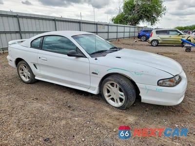 Czwarte zdjęcie samochodu z boku: 1998 FORD MUSTANG GT VIN:1FAFP42X8WF193050 - miniatura