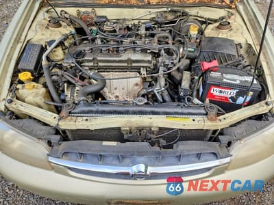 Zdjęcie 11 z 13 samochodu: 1999 NISSAN ALTIMA XE VIN:1N4DL01D3XC240104 - miniatura