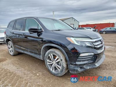 Czwarte zdjęcie samochodu z boku: 2017 HONDA PILOT EXL VIN:5FNYF6H67HB090967 - miniatura
