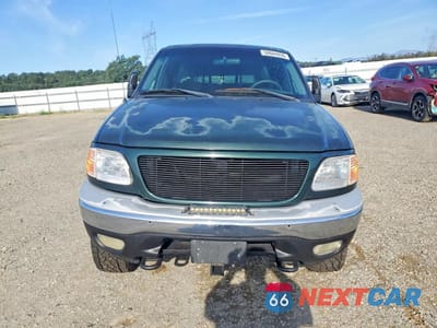 Piąte zdjęcie samochodu w środku: 2001 FORD F150 VIN:1FTRX18L81NA69644 - miniatura