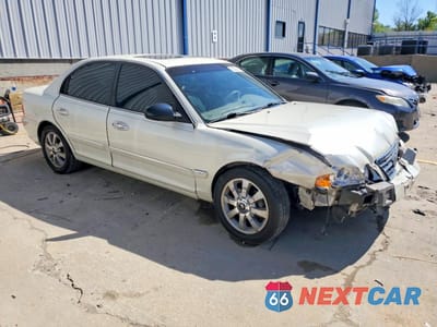 Czwarte zdjęcie samochodu z boku: 2004 KIA OPTIMA LX V6 VIN:KNAGD128645330064 - miniatura