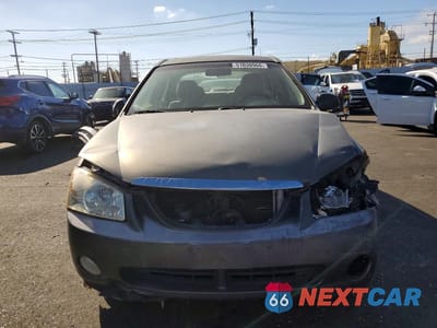 Piąte zdjęcie samochodu w środku: 2005 KIA SPECTRA VIN:KNAFE122355204590 - miniatura