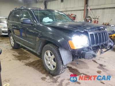 Czwarte zdjęcie samochodu z boku: 2009 JEEP GRAND CHEROKEE LAREDO VIN:1J8GR48K09C556704 - miniatura