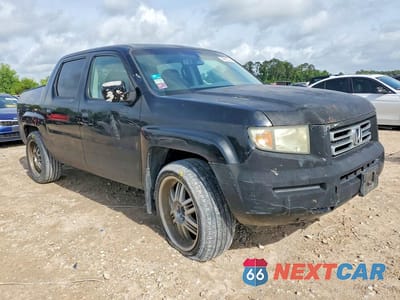 Czwarte zdjęcie samochodu z boku: 2007 HONDA RIDGELINE RTL VIN:2HJYK16507H520562 - miniatura