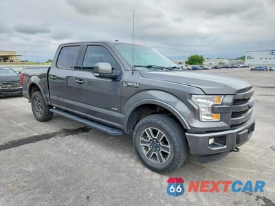 Czwarte zdjęcie samochodu z boku: 2015 FORD F150 SUPERCREW VIN:1FTEW1EG2FKE36099 - miniatura