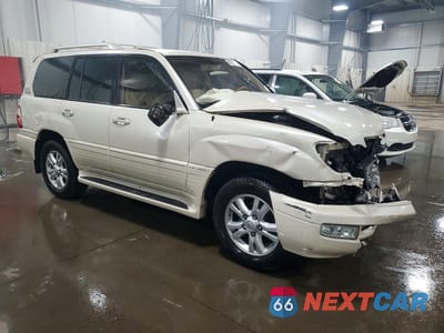 Czwarte zdjęcie samochodu z boku: 2003 LEXUS LX 470 BASE VIN:JTJHT00W533532486 - miniatura