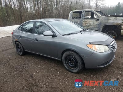 Czwarte zdjęcie samochodu z boku: 2010 HYUNDAI ELANTRA BLUE VIN:KMHDU4BD9AU086654 - miniatura