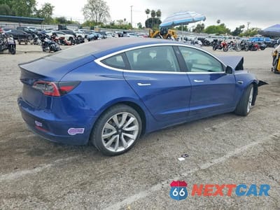 Trzecie zdjęcie samochodu z tyłu: 2018 TESLA MODEL 3 VIN:5YJ3E1EA5JF164479 - miniatura