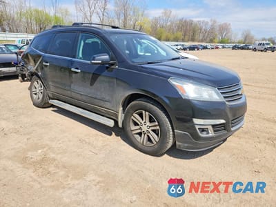 Czwarte zdjęcie samochodu z boku: 2016 CHEVROLET TRAVERSE LT VIN:1GNKRGKD9GJ276566 - miniatura