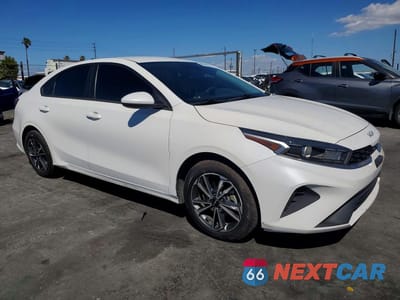 Czwarte zdjęcie samochodu z boku: 2022 KIA FORTE LXS VIN:3KPF24AD1NE488449 - miniatura