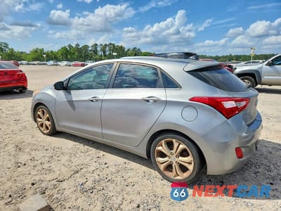 Drugie zdjęcie samochodu z przodu: 2014 HYUNDAI ELANTRA GT BASE VIN:KMHD35LH0EU165307 - miniatura