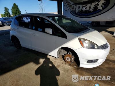 Czwarte zdjęcie samochodu z boku: 2012 HONDA FIT SPORT VIN:JHMGE8H52CC015728 - miniatura