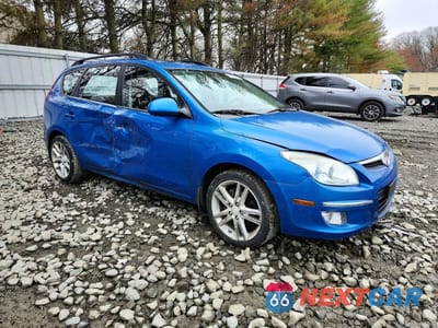 Czwarte zdjęcie samochodu z boku: 2010 HYUNDAI ELANTRA TOURING SE VIN:KMHDC8AE3AU056912 - miniatura