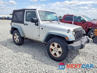 Czwarte zdjęcie samochodu z boku: 2011 JEEP WRANGLER SPORT VIN:1J4AA2D14BL529446 - miniatura