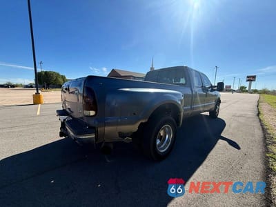 Czwarte zdjęcie samochodu z boku: 2006 FORD F350 SUPER DUTY VIN:1FTWW32P86EA59281 - miniatura