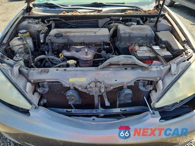 Zdjęcie 11 z 11 samochodu: 2003 TOYOTA CAMRY XLE VIN:4T1BE30K93U708625 - miniatura