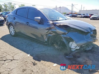 Czwarte zdjęcie samochodu z boku: 2016 SCION IA BASE VIN:3MYDLBZV5GY136239 - miniatura