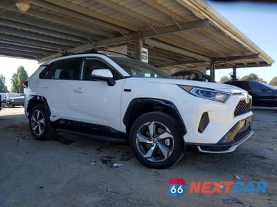 Czwarte zdjęcie samochodu z boku: 2021 TOYOTA RAV4 PRIME SE VIN:JTMAB3FV9MD065351 - miniatura