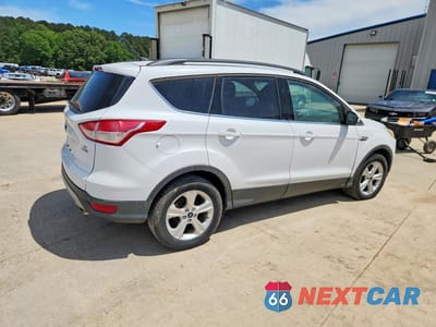 Trzecie zdjęcie samochodu z tyłu: 2016 FORD ESCAPE SE VIN:1FMCU9G96GUC13754 - miniatura