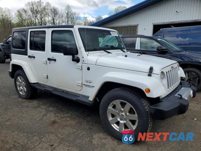 Czwarte zdjęcie samochodu z boku: 2017 JEEP WRANGLER UNLIMITED SAHARA VIN:1C4BJWEG3HL582040 - miniatura