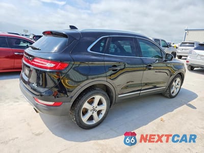 Trzecie zdjęcie samochodu z tyłu: 2016 LINCOLN MKC PREMIERE VIN:5LMCJ1C99GUJ03584 - miniatura