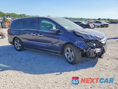 Czwarte zdjęcie samochodu z boku: 2018 HONDA ODYSSEY EXL VIN:5FNRL6H71JB043042 - miniatura