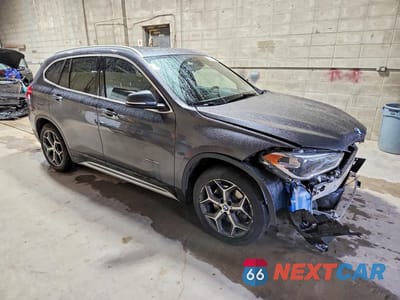Czwarte zdjęcie samochodu z boku: 2016 BMW X1 XDRIVE28I VIN:WBXHT3Z39G4A48002 - miniatura