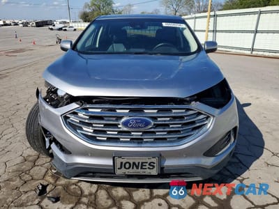 Piąte zdjęcie samochodu w środku: 2022 FORD EDGE TITANIUM VIN:2FMPK4K96NBB03596 - miniatura