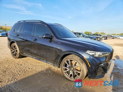 Czwarte zdjęcie samochodu z boku: 2022 BMW X7 XDRIVE40I VIN:5UXCW2C08N9M13241 - miniatura