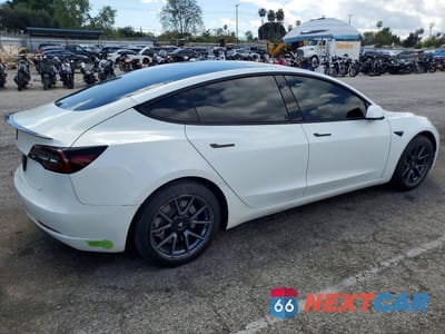 Trzecie zdjęcie samochodu z tyłu: 2023 TESLA MODEL 3 VIN:5YJ3E1EA0PF548923 - miniatura