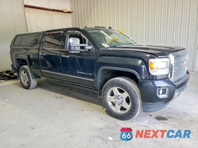 Czwarte zdjęcie samochodu z boku: 2015 GMC SIERRA K2500 DENALI VIN:1GT120E80FF137216 - miniatura
